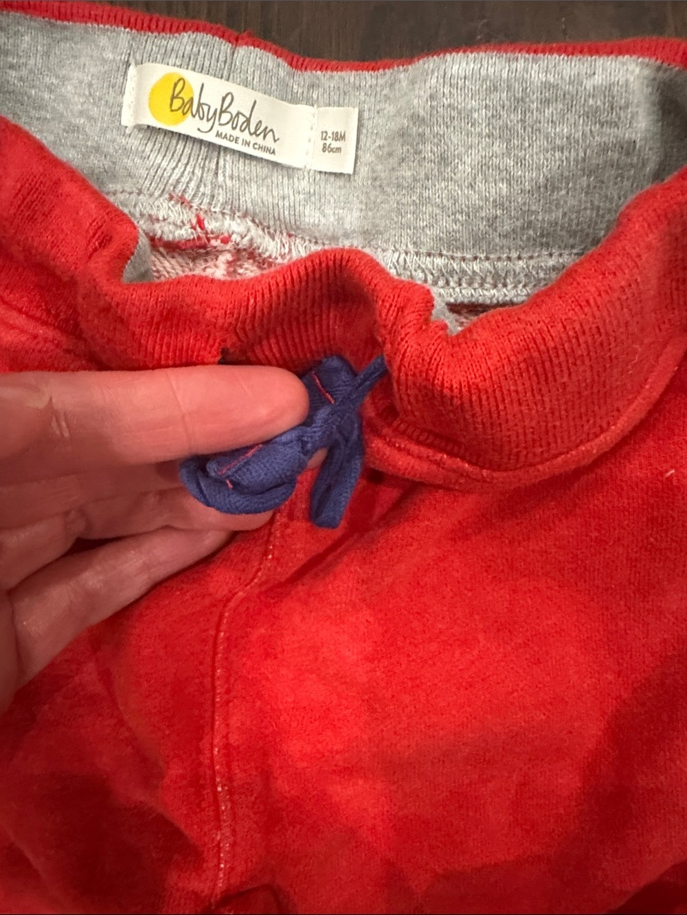 Baby Boden Red Jogger Pants with Blue Striped Cuffs and Star Detail on Backside - Picture 7 of 7